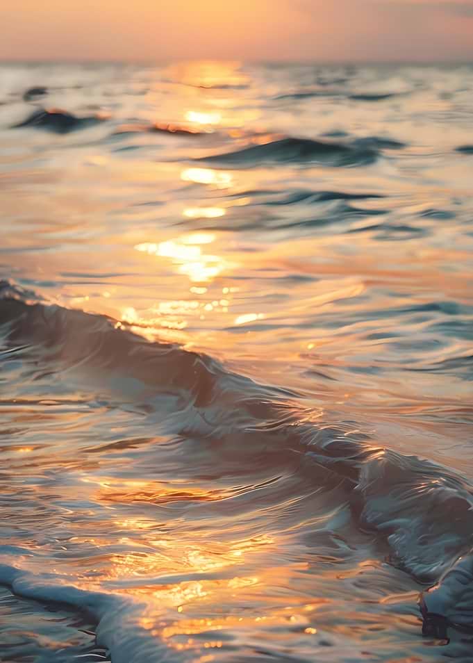 Golden Sunset Over Gentle Ocean Waves