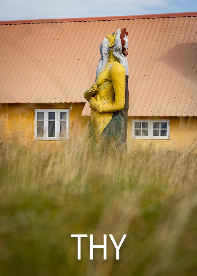 King Neptune in front of a summer house