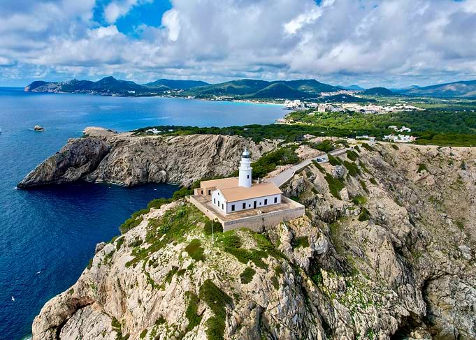 Lighthouse on Rocky Coastline