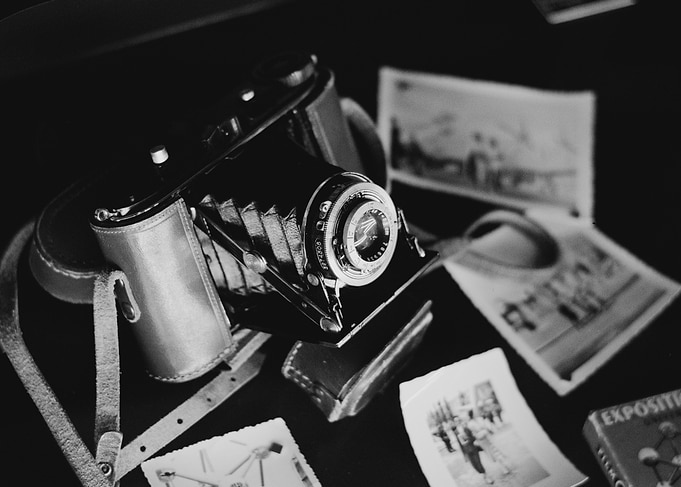 Vintage Camera and Photographs Still Life