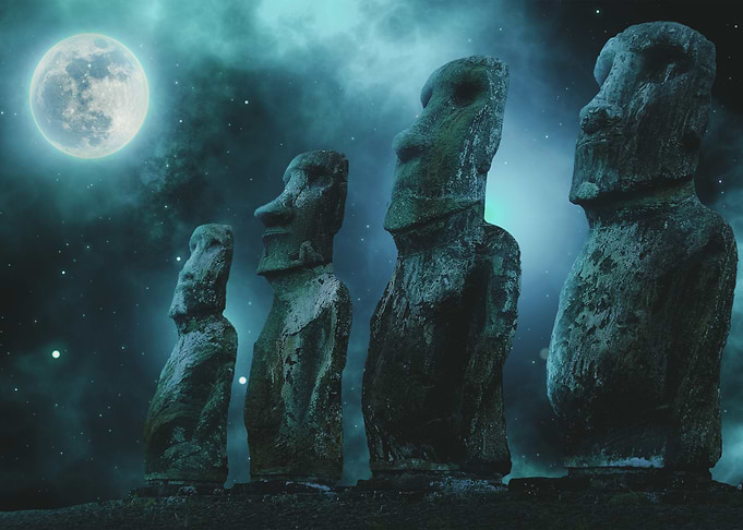 moai statues under moonlight