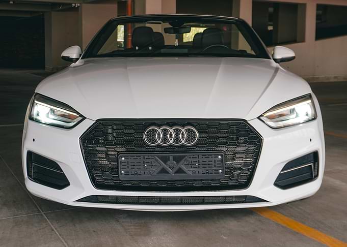 Front view of a white Audi car