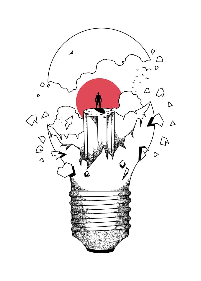 Broken Lightbulb with Figure and Sunset