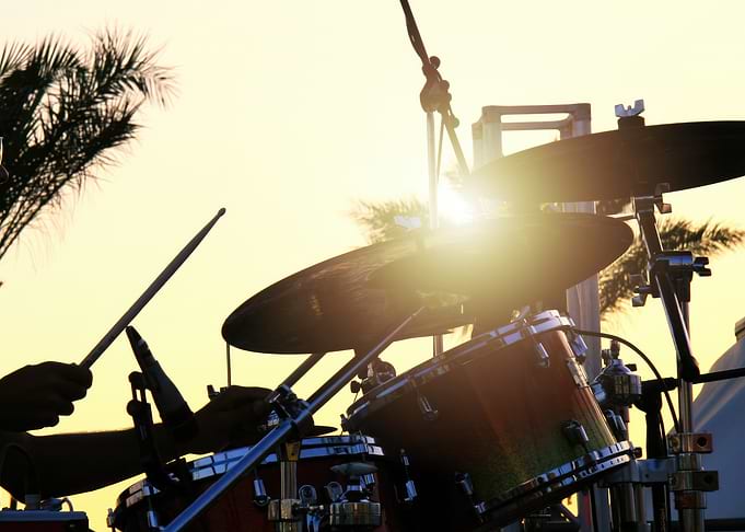 Drum Set Performance at Sunset