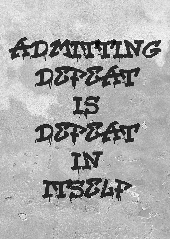 Admitting Defeat Graffiti on Concrete Wall