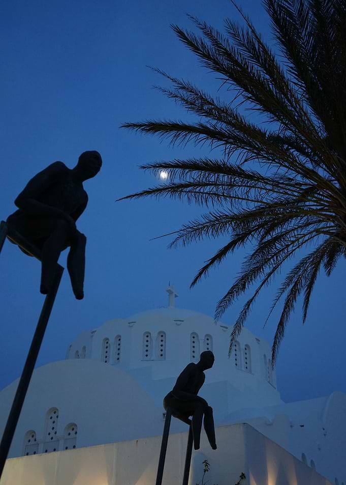 Santorini Nightscape with Sculptures and Church