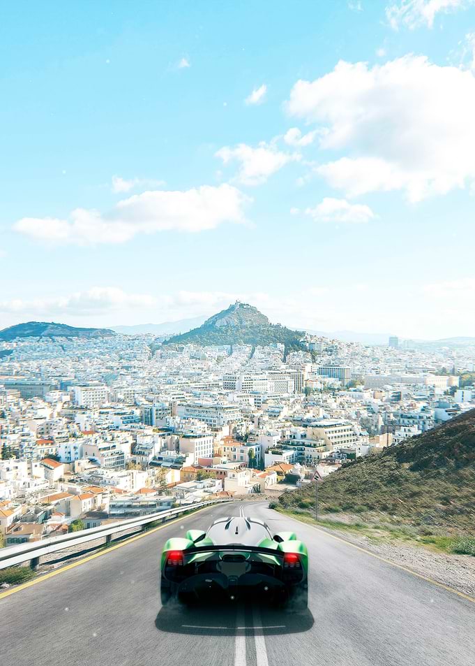 Green Sports Car Driving on Road
