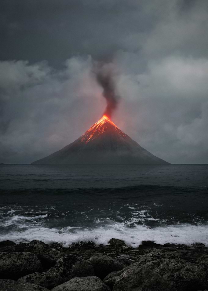 Erupting Volcano in Ocean Landscape