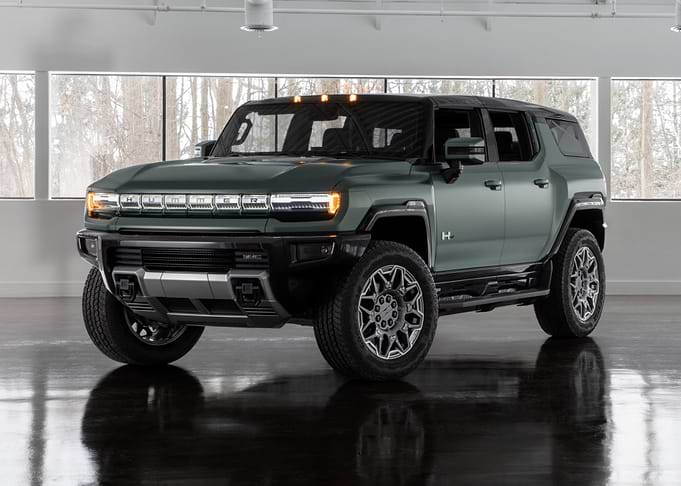 Green Hummer EV SUV Studio Shot