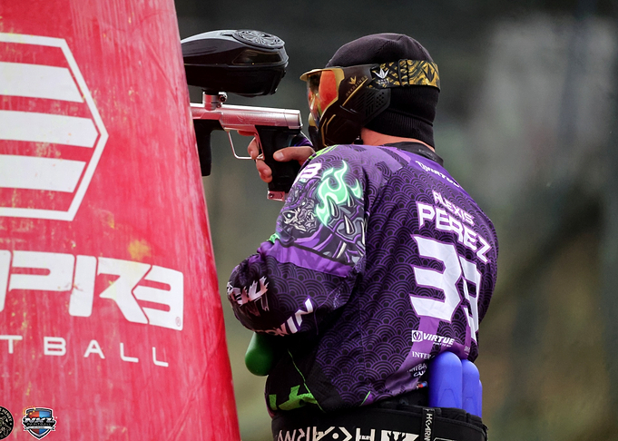 Paintball Player Aiming Gun
