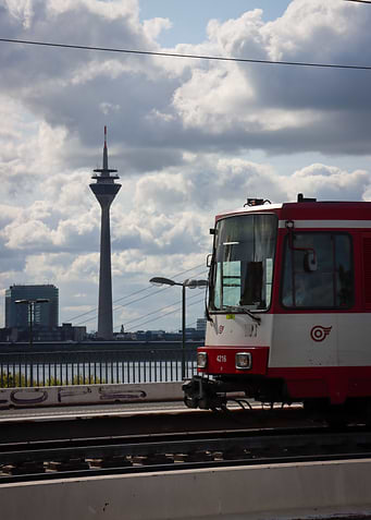 Düsseldorf cityscape with train and tower