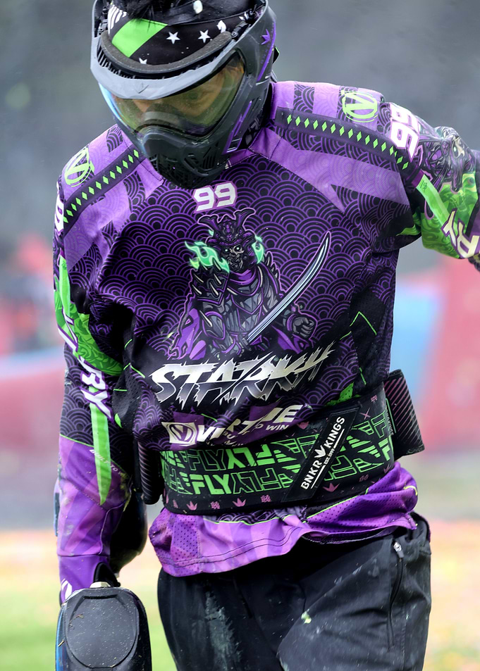 Paintball Player in Action Gear