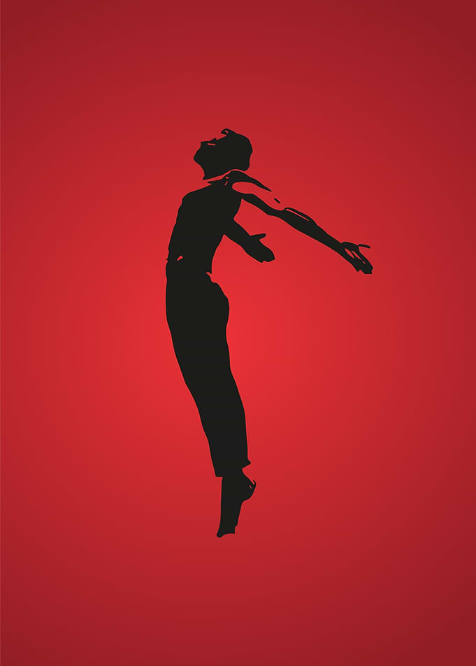 Silhouette of a dancer on red background