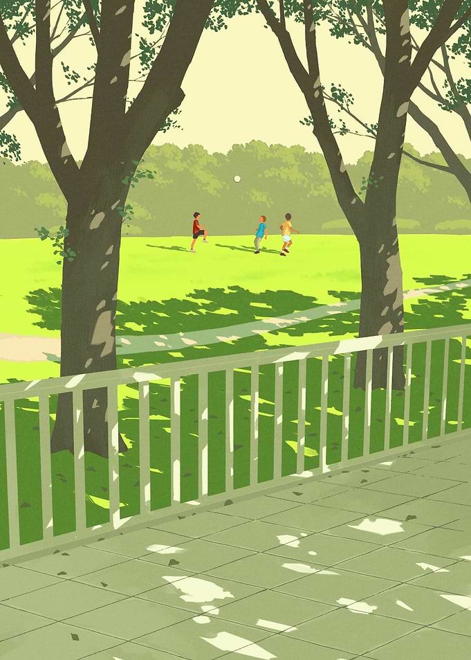 Children playing soccer in a park