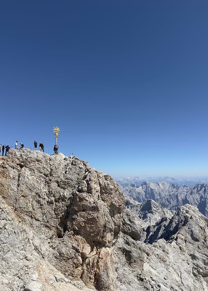 Mountain Peak Zugspitze with Golden Cross and People
