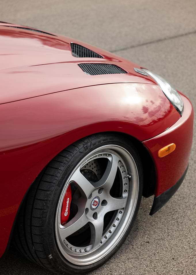 Red Toyota Supra mark4 A80 Car Front Detail
