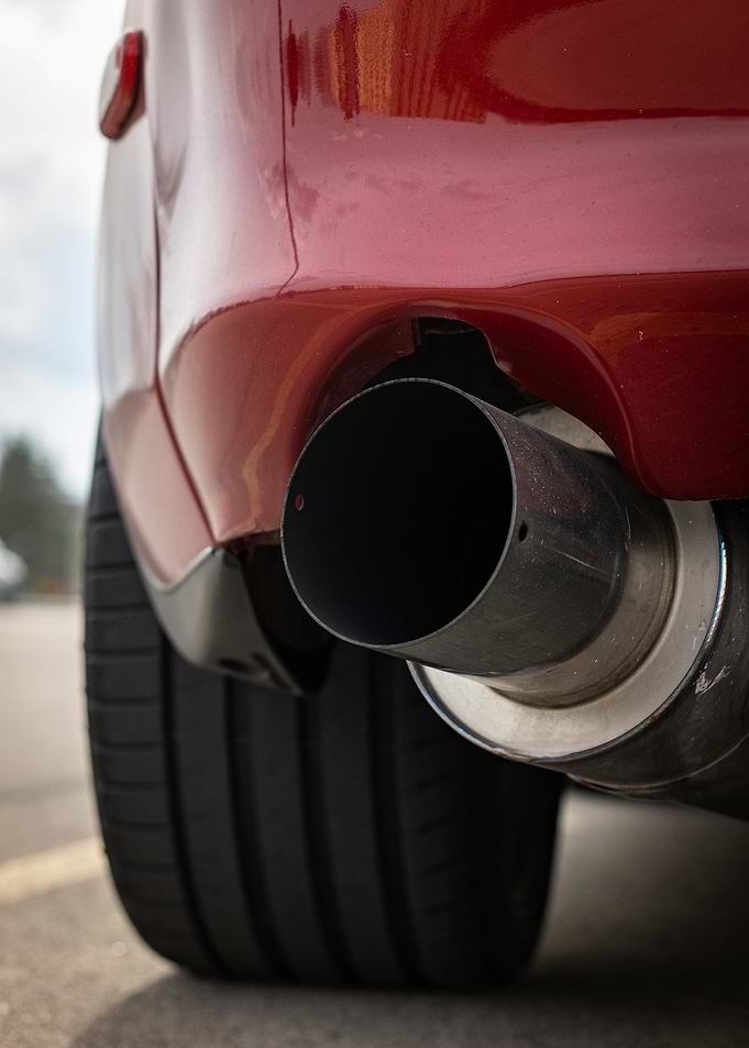 Red Toyota Supra mark4 a80 Car Exhaust and Tire Detail