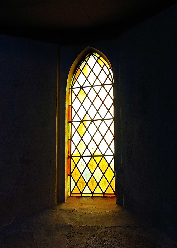 Stained Glass Window in Dark Room
