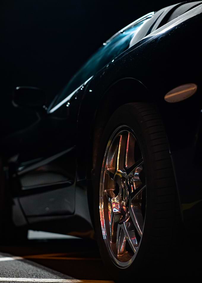 Sleek Black C5 corvette Car at Night