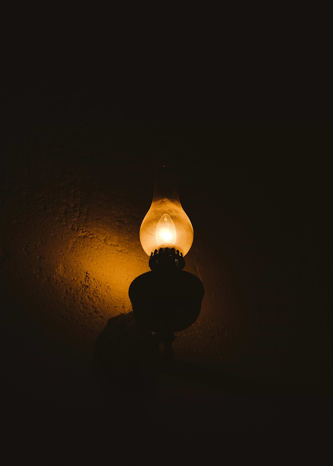 Vintage Lamp Illuminating Dark Room