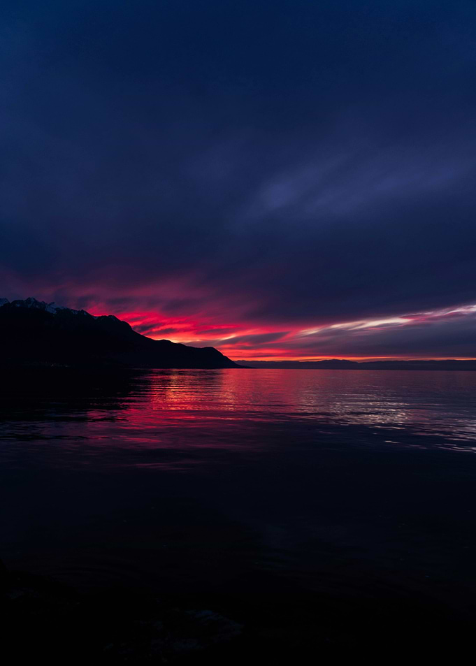 Dramatic sunset over dark water