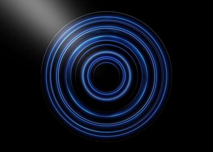 Abstract Blue Concentric Circles on Black
