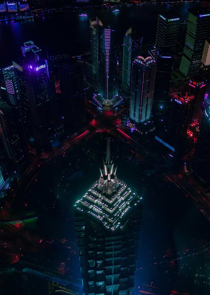 night cityscape with illuminated skyscrapers