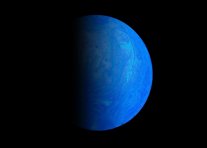 blue planet in dark space