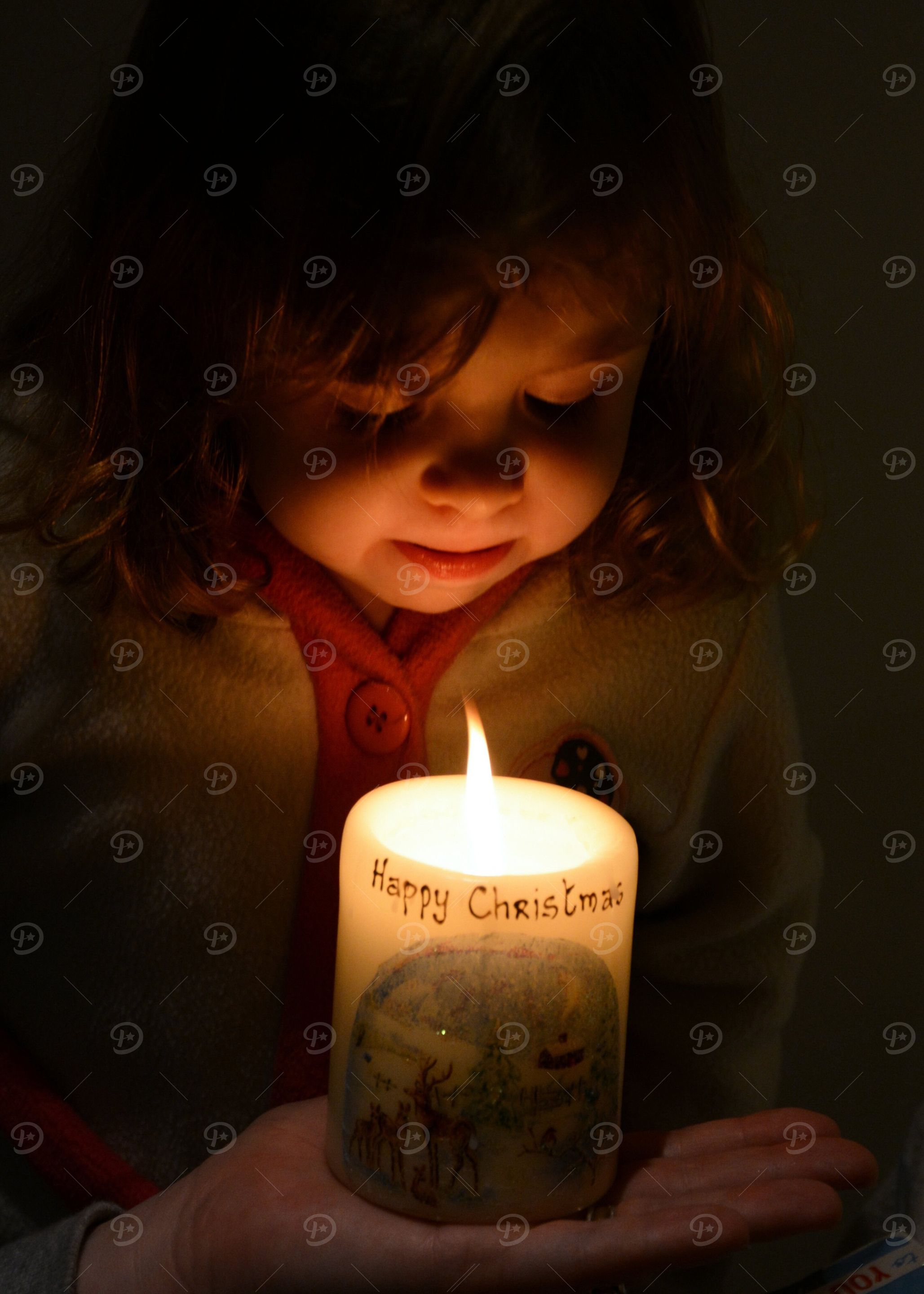 Child with Christmas Candle