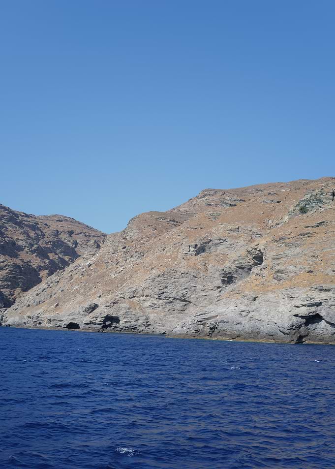 Rocky Coastline with Blue Sea Greece Mykonos