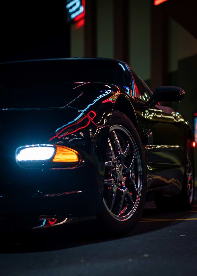 Sleek Black C5 corvette Car at Night