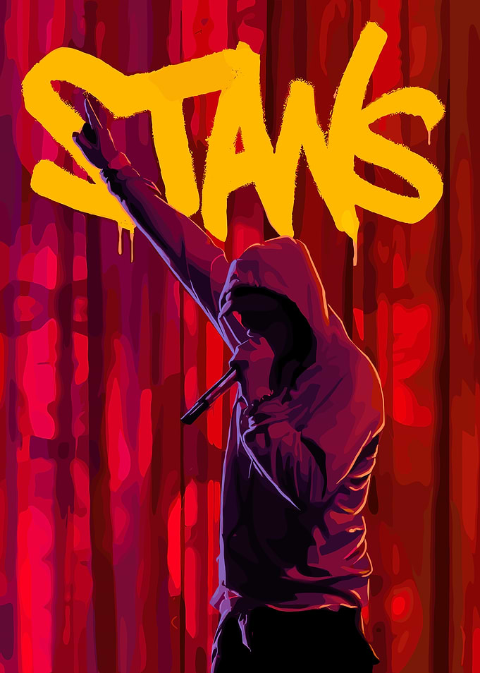 Rapper on Stage with 'STANS' Graffiti