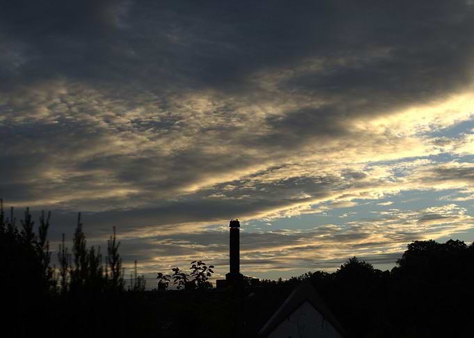 Dramatic Sky with Tower Silhouette