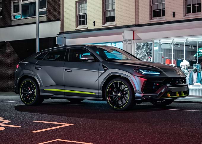 Gray Lamborghini Urus on City Street