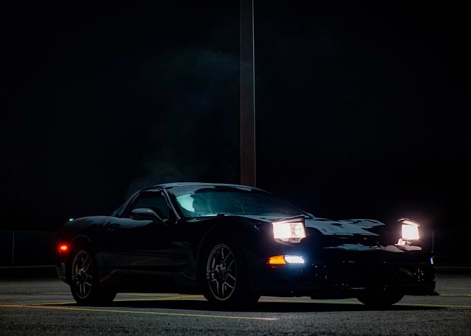 Black C5 corvette Sports Car at Night frosted