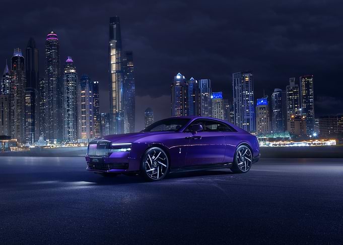 Purple Rolls Royce in Cityscape