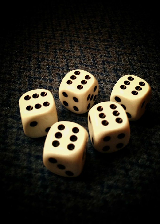 Five Dice Showing Sixes