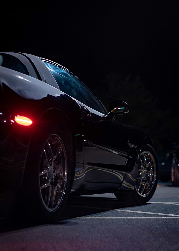 Sleek Black C5 corvette Sports Car at Night