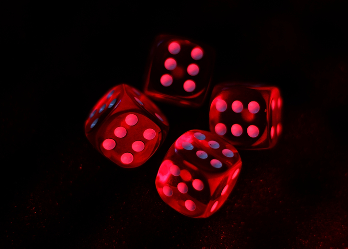 Red Dice on Black Background