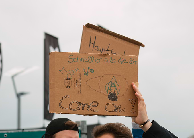 Handmade Protest Signs with Rocket Drawing