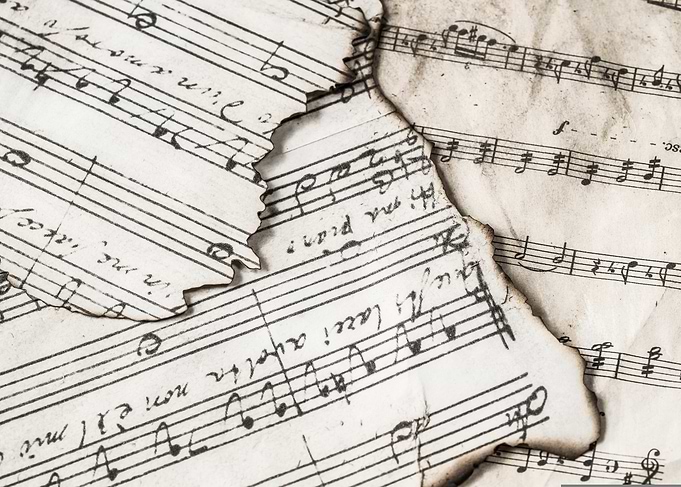 Vintage Sheet Music with Burned Edges