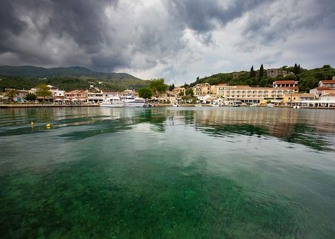 Picturesque coastal town with clear water, Kassiopi, Corfu