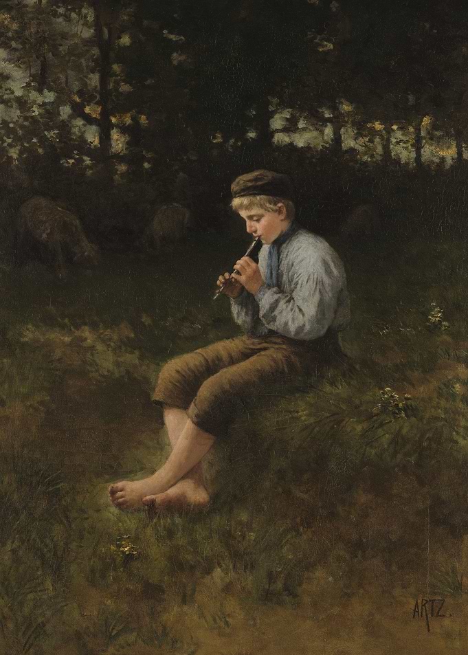 Boy playing flute in a field