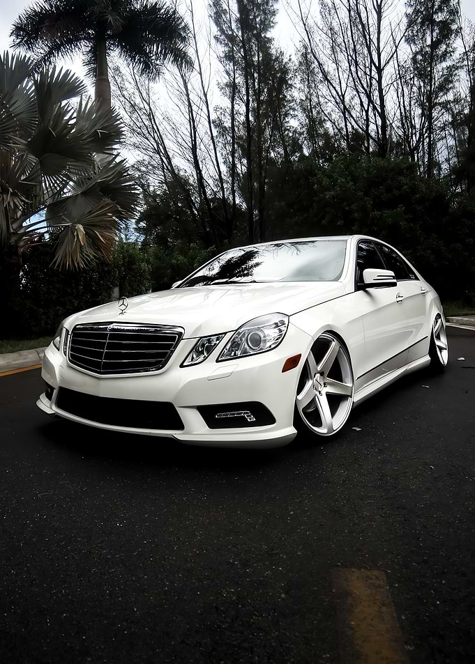 White Mercedes-Benz on Asphalt Road