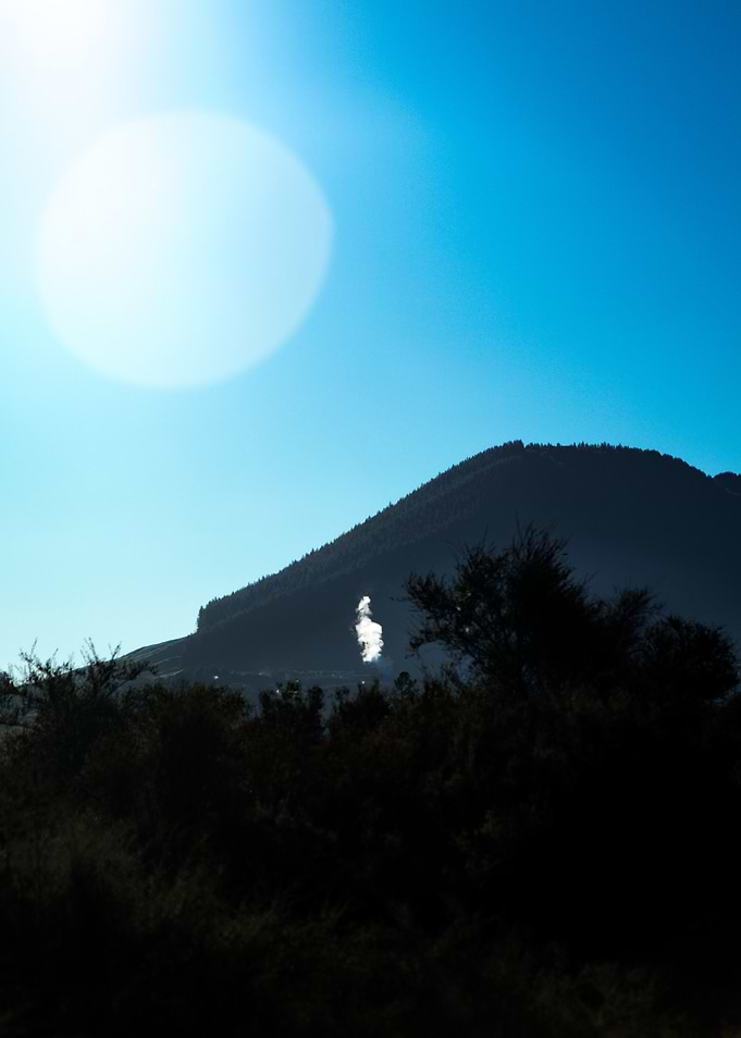 Mountain Silhouette with Bright Sky