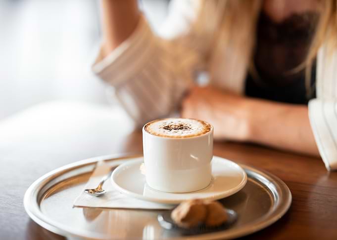 Cappuccino on a silver tray