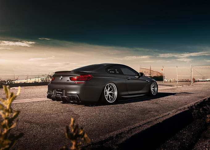 Gray BMW M6 Coupe on Asphalt