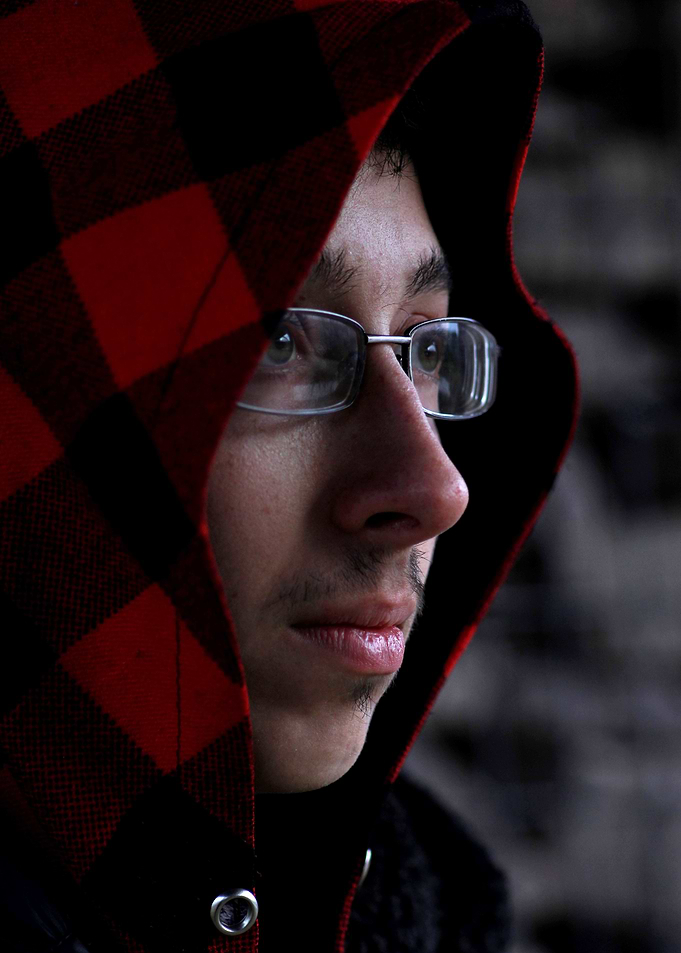 Man in Red and Black Hood