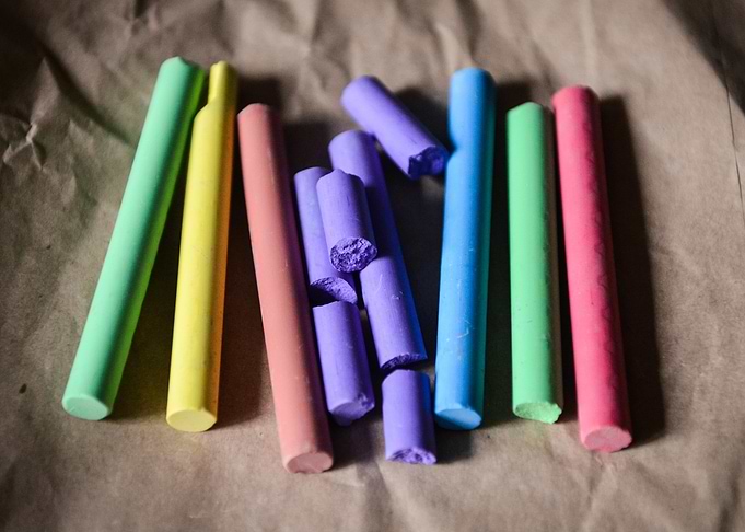 Colorful Chalk Sticks on Brown Paper