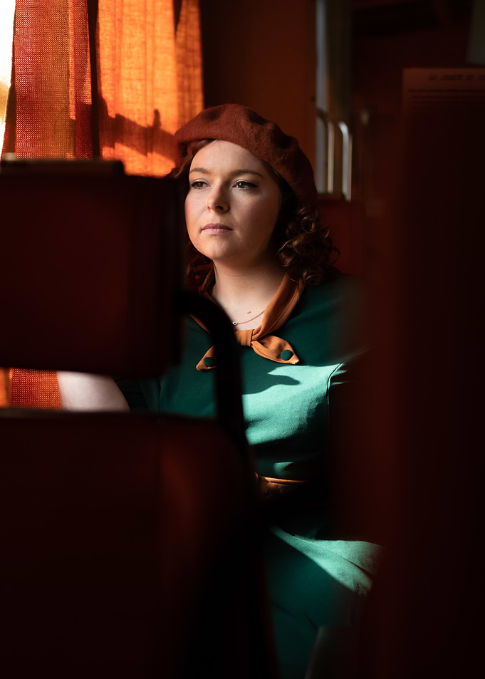 Woman in Green Dress and Beret